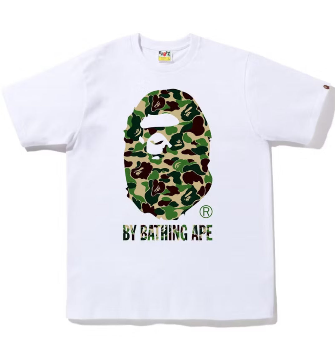 White t-shirt with a colorful logo and 'By Bathing Ape' text on a white background